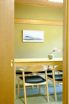 a dining room with a table and two chairs at F-City \u4e2d\u845b\u897f iii in Tokyo