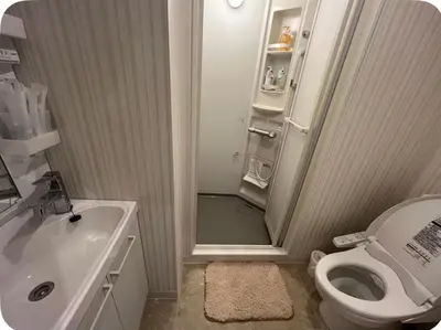 a bathroom with a shower and a toilet and a sink at \u677e\u4e43\u7af9102 in Tokyo