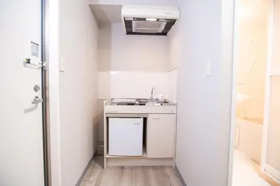 a small kitchen with a sink and a stove at Asakusabashi MY Hostel max2 people-TT0495 in Tokyo
