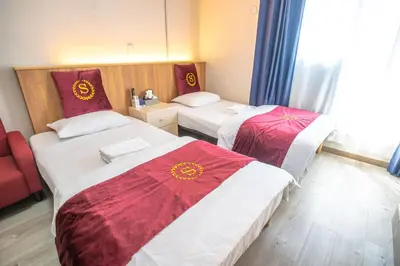 a hotel room with two beds with red and white sheets at Asakusabashi MY Hostel-max3 people-TT0509 in Tokyo