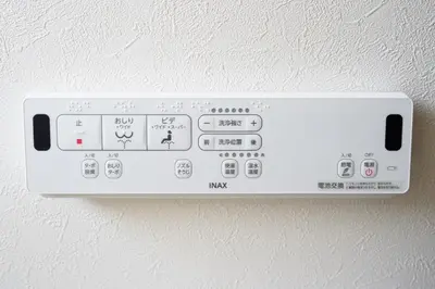 a white control panel on a wall at Chill Place 120 Ayase in Tokyo