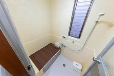 a small bathroom with a shower and a window at 1200IN&OUT 5people 35m2 2Queenbed! 1sofabed! Exclusive house Shinjuku 18 minutes Shibuya 22 minutesIkebukuro 11 minutes in Tokyo