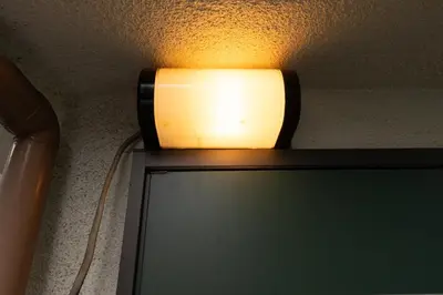 a light sitting on top of a tv at 101 Tokyo Ikebukuro apartment near Pokemon Center in Tokyo