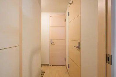 a hallway with a closet and a door at Sakura Court Ebisu 101 in Tokyo