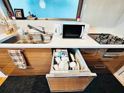 a kitchen with a sink and a counter top at Skytree Detached Home in Tokyo
