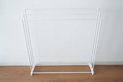 a white shelf in a room with a wall at Sgc\u4e16\u7530\u8c371\u4e01\u76ee in Tokyo