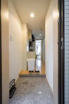 a hallway of a house with a sink in it at Sakura Court Ebisu 403 in Tokyo