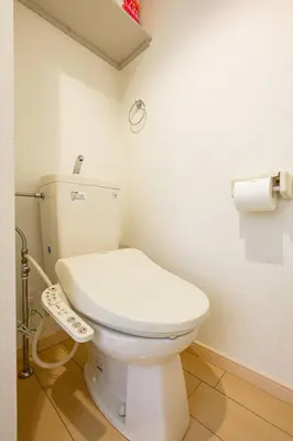 a bathroom with a white toilet in a room at Sakura Court Ebisu 403 in Tokyo