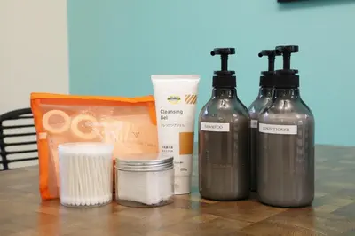 a group of three bottles of soap and a container at Sakura Court Ebisu 501 in Tokyo