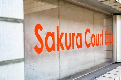 a sula conference sign on the side of a building at Sakura Court Ebisu 502 in Tokyo