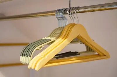 a wooden utensil rack hanging from a ceiling at Sakura Court Ebisu 502 in Tokyo