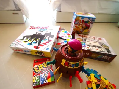 a table topped with boxes of toys and a toy fire hydrant at Cassyta Gotanda Zeko-Residence in Tokyo