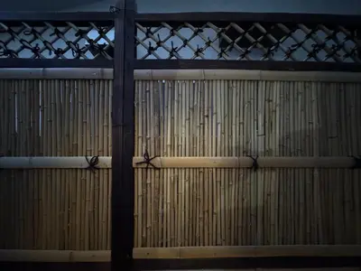 a wooden gate with a fence behind it at \u30d1\u30ec\u30f4\u30e9\u30f3\u30b7\u30e5 in Tokyo