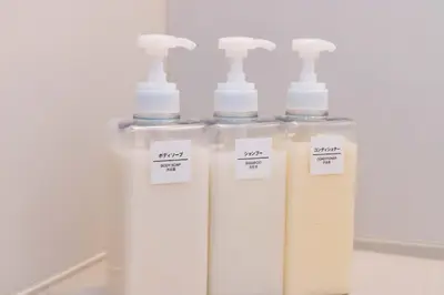 two bottles of soap with sticky notes on them at \u4e80\u67095\u4e01\u76ee301 in Tokyo
