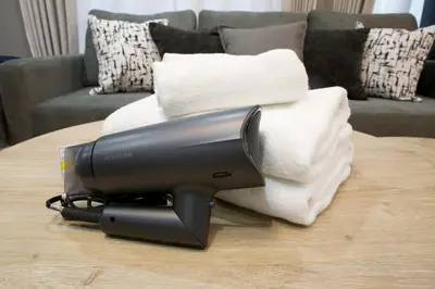 a hair dryer sitting on top of a table at Higashi Koiwa 6 Chome House 1F in Tokyo