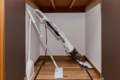 a room with two vacuum cleaners on the floor at BF Stay Shinjukugyoen in Tokyo