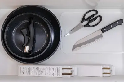 a pair of scissors and a plate in a drawer at \u4e80\u67095\u4e01\u76ee401 in Tokyo