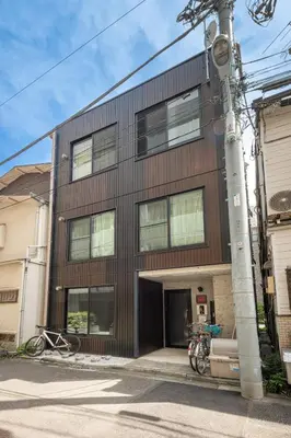 a building with two bikes parked in front of it at -Centray Okachimachi 102- 1 minute to Akihabara Station and Ueno Station without transfers! in Tokyo