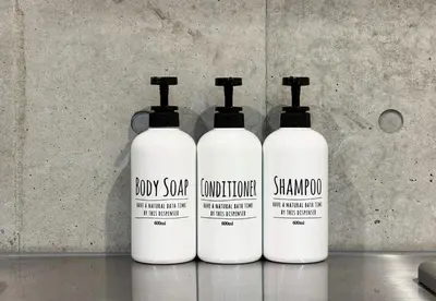 three bottles of soap and shampoo sitting on a counter at -Centray Okachimachi 102- 1 minute to Akihabara Station and Ueno Station without transfers! in Tokyo