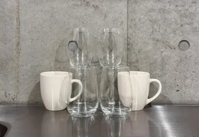 a group of wine glasses and cups on a table at -Centray Okachimachi 102- 1 minute to Akihabara Station and Ueno Station without transfers! in Tokyo