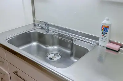 a kitchen sink with a faucet on a counter at \u4e80\u67095\u4e01\u76ee201 in Tokyo
