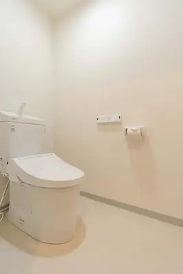 a white bathroom with a toilet in a room at \u4e80\u67095\u4e01\u76ee201 in Tokyo
