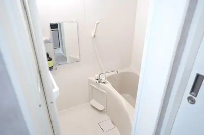 a white bathroom with a sink and a mirror at 11AM out, Asakusa Base, 3F Skytree-View Rooms, Projector Mini Theater in Tokyo