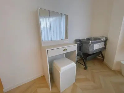 a dressing table with a mirror on top of it at Hotel Lien Tokyo2 in Tokyo