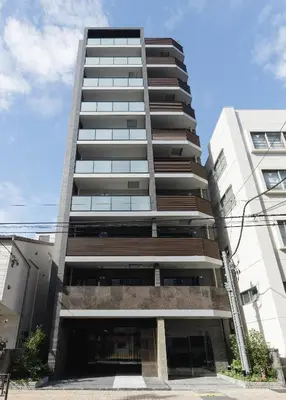 a tall apartment building with a lot of windows at ROLES Ryusen 901 in Tokyo