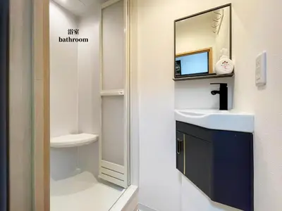 a bathroom with a sink and a mirror at 7\u6642IN19\u6642OUT # \u6c60\u888b\u738b\u5b50\u8d64\u7fbd\u99c5\u9001\u8fce\u7121\u6599 # \u30f4\u30a3\u30e9\u4e00\u8ed2\u5bb6\u8cb8\u5207# \u99c5\u8fd18\u5206# \u6700\u59276\u540d# 7 00 IN19 00 OUT # Free pick-up at Ikebukuro, Oji, and Akabane Stations # Whole house rental in Tokyo