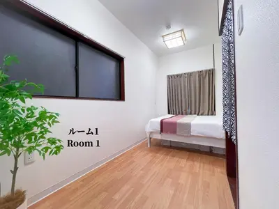 a room with a bedroom with a bed and a window at 7\u6642IN19\u6642OUT # \u6c60\u888b\u738b\u5b50\u8d64\u7fbd\u99c5\u9001\u8fce\u7121\u6599 # \u30f4\u30a3\u30e9\u4e00\u8ed2\u5bb6\u8cb8\u5207# \u99c5\u8fd18\u5206# \u6700\u59276\u540d# 7 00 IN19 00 OUT # Free pick-up at Ikebukuro, Oji, and Akabane Stations # Whole house rental in Tokyo