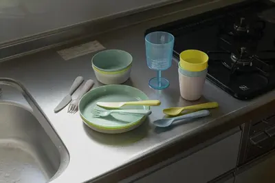 a kitchen counter with plates and cups and a sink at Direct Haneda Access &Onsen 1-min Walk SAMURAI STAY ZEN in Tokyo