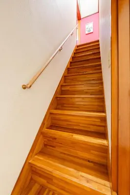 a staircase in a house with wooden floors at TokyoDisneyAkihabara,Entire House,8Ppl,5Bedl60m2 in Tokyo