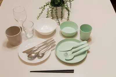 a white table with plates and silverware on it at TokyoDisneyAkihabara,Entire House,8Ppl,5Bedl60m2 in Tokyo