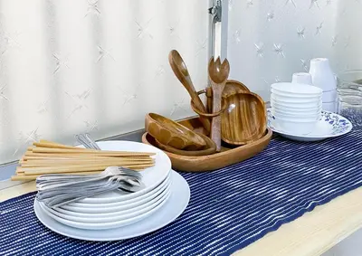 a table with plates and utensils on a table at gjbbkoiwa in Tokyo