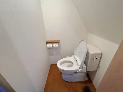 a small bathroom with a toilet with the lid up at \u738b\u5b50Stay\u4f73 in Tokyo