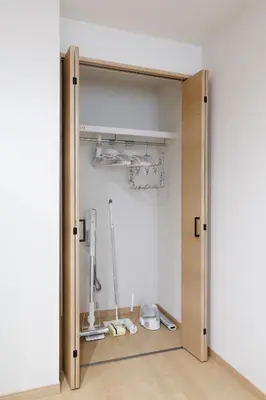 a room with a door open to a room with tools at LIFE TOWN Kameari in Tokyo