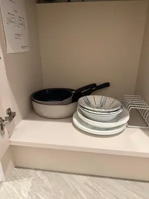 a group of plates and a pan on a counter at The Asakusa Townhouse in Tokyo