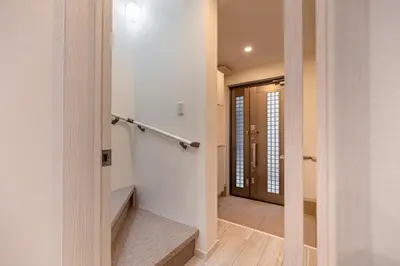 a hallway with a staircase and a door to a room at -Imado- Within walking distance of Asakusa Station and Tokyo Skytree! in Tokyo