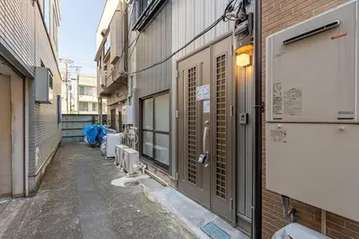 a narrow alley with a building and a street at -Imado- Within walking distance of Asakusa Station and Tokyo Skytree! in Tokyo
