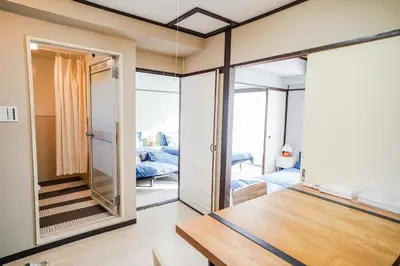 a room with a glass door leading to a bedroom at 402Room 1 Stop from Ikebukuro Entire 35m on 4st Floor 2 Bedrooms for up to 6 Guests 3Minute Walk to Don Quijote in Tokyo