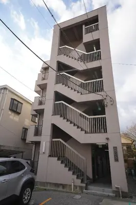 a building with stairs on the side of it at 402Room 1 Stop from Ikebukuro Entire 35m on 4st Floor 2 Bedrooms for up to 6 Guests 3Minute Walk to Don Quijote in Tokyo