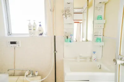 a bathroom with a shower and a sink at 403Room 1 Stop from Ikebukuro Entire 35m on 4st Floor 2 Bedrooms for up to 6 Guests 3Minute Walk to Don Quijote in Tokyo