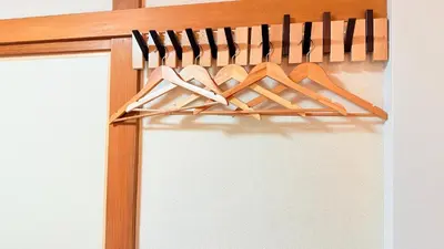 a bunch of wooden hangers with cooking utensils at Higashi-Jujo-house \u7950\u6cfd KI0478 in Tokyo