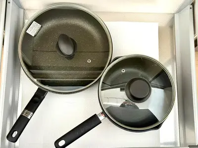 a pot and a frying pan in a drawer at SELENTE-S3 - Tokyo Tower 2BR - Central Tokyo in Tokyo
