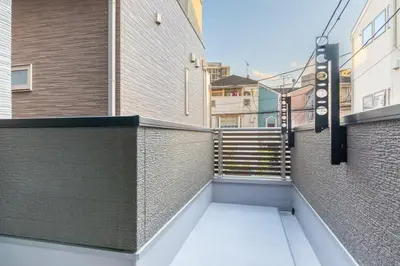 a balcony with a staircase on the side of a building at -Baba 3chome- 8-minute walk from Takadanobaba station in Tokyo