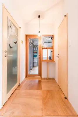 an empty room with a door and a hallway at GrapeHouse Koenji in Tokyo