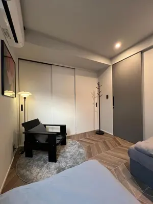 a living room with a piano and a couch at Koenji house, 2 bedrooms 2F 47m2, 5 min to Shinjuku in Tokyo