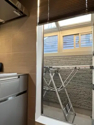 a kitchen with a towel rack and a window at Koenji house, 2 bedrooms 2F 47m2, 5 min to Shinjuku in Tokyo