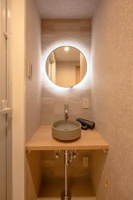 a bathroom with a sink and a mirror at 51A Momiji Newly Opened 3 minutes from Ayase Station East Exit Modern Welcome to Exam Candidates and Families Private Room Rental in Tokyo
